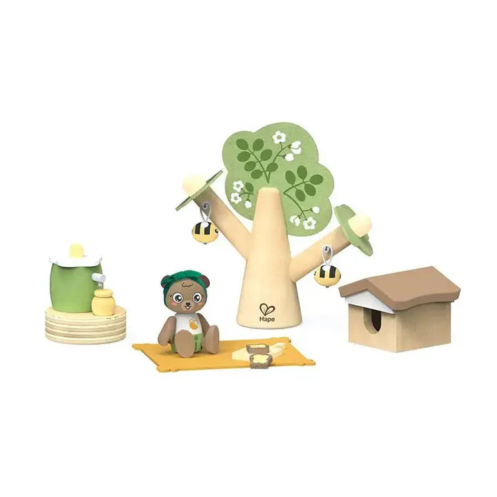 Child playing with toys on a table outdoors