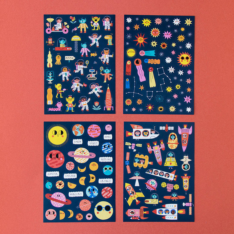 Four colorful space-themed posters on a red background